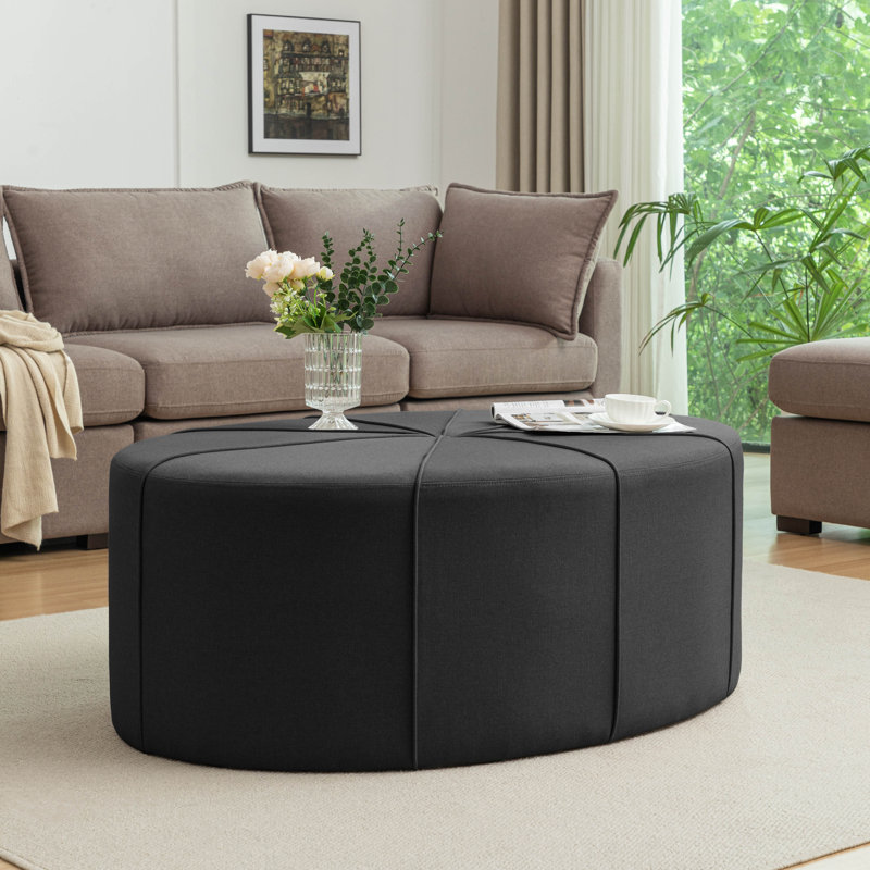 Repose-pieds de cocktail ovale de 47,6 po en tissu Wrought Studio ™ Alma, Tissu gris foncé