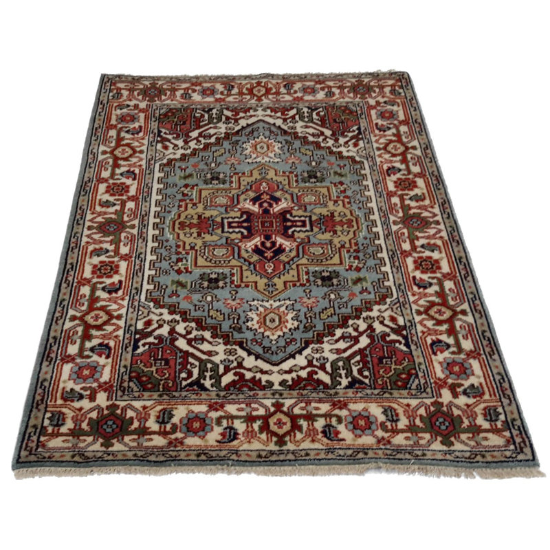 Caeley Oriental Area Rug in Blue