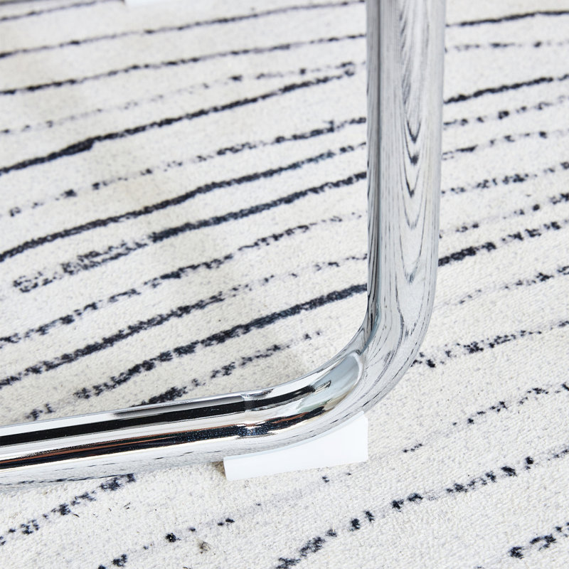 Table et chaise pour la salle à manger: pierre frittée à motif marbré de 63 po x 31,5 po avec pieds en forme d'oc uniques 4 chaises en polyuréthane noires Métal argenté - support à finition lisse Repas de famille confortables