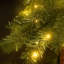 Slender Green Tropical Christmas Tree with Lights-160899563