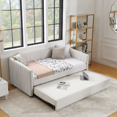Lit de jour rembourré confortable avec lit gigogne, idéal pour la détente et l'espace de couchage supplémentaire, avec rayures verticales et matériaux de qualité