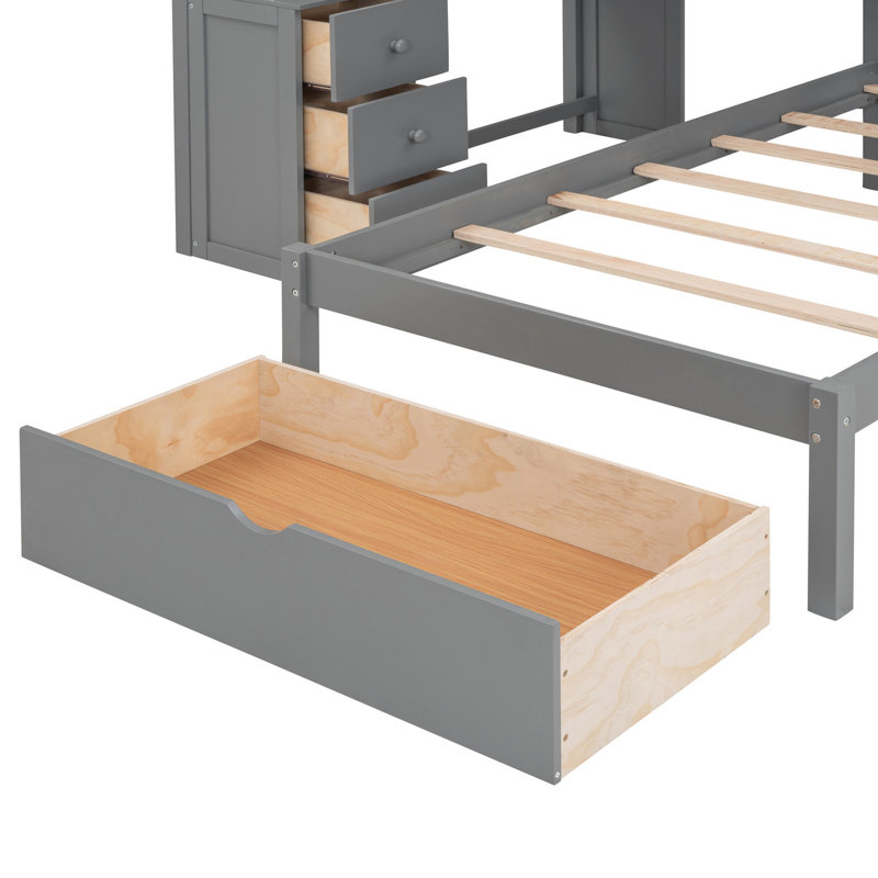 Lit double superposé au-dessus d'un lit double gris avec bureau pratique et généreuses options de rangement confortables pour une chambre à coucher efficace