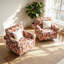 Fauteuil pivotant rembourré avec accoudoirs roulés et garniture cloutée-133583000