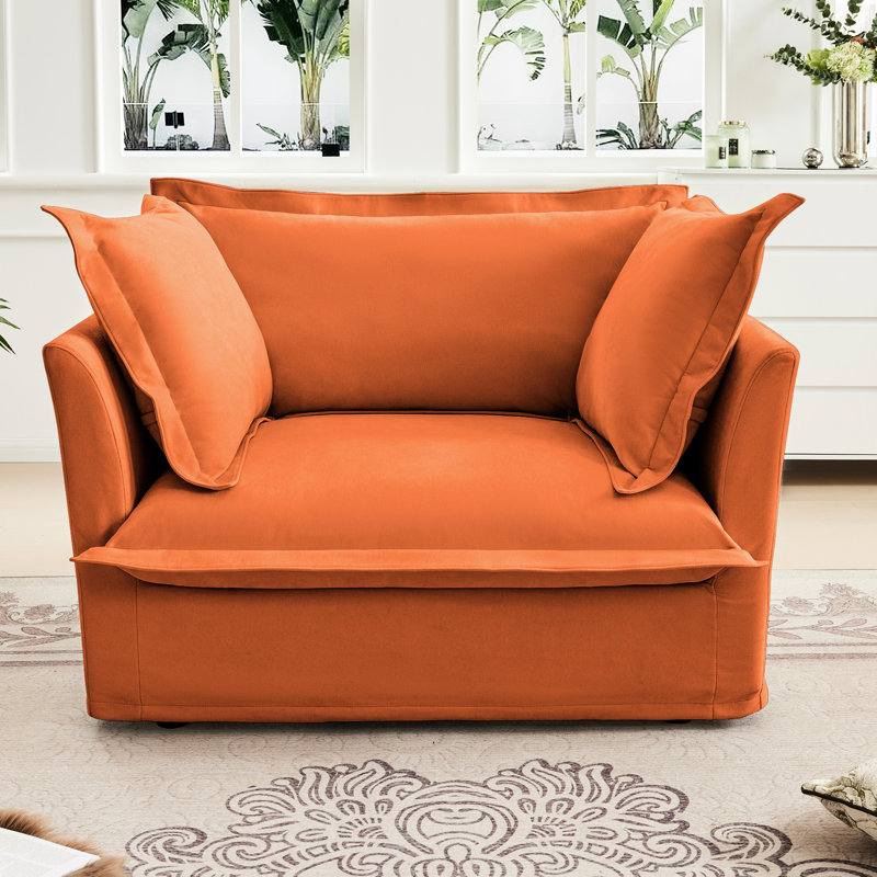 Simple, orange, fauteuil en chenille, confort luxueux, grand dossier et coussins décoratifs, housses amovibles, structure solide de construction stable