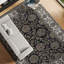 Tapis oriental noir / ivoire en laine noué à la main Magnolia