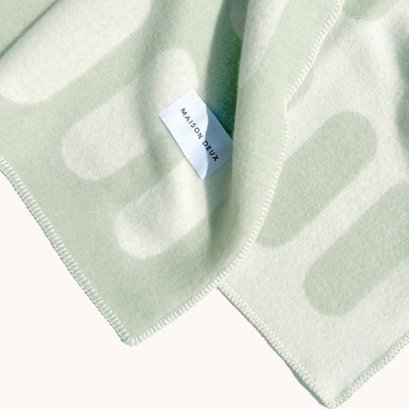 CUBICS CHILL PILL Geometric Wool Jacquard Blanket, Green