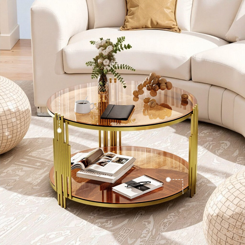 Table basse moderne en verre brun avec base tambour doré et tablette inférieure