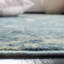 Tapis turquoise à motif abstrait Thursa-20882747