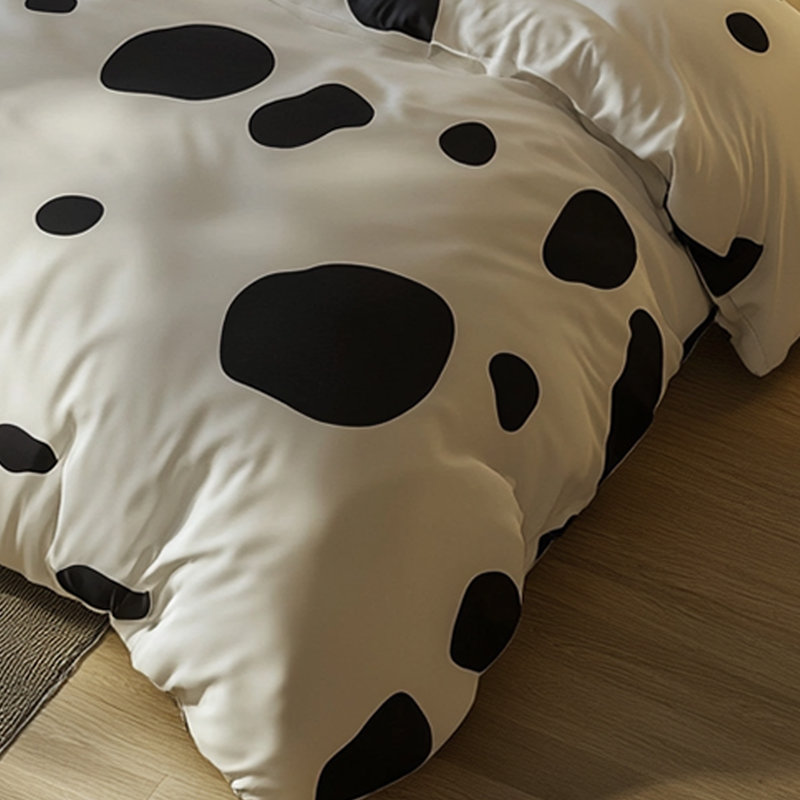 Literie moderne noire à pois blancs