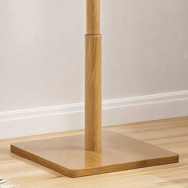 This Brown, Sturdy Floor-Standing Coat Rack Features A Solid Square Base, Eight Built-In Hooks, And Is Easy To Assemble. It's Suitable For Storing Clothes And Hats In Bedrooms, Entryways, And Offices.