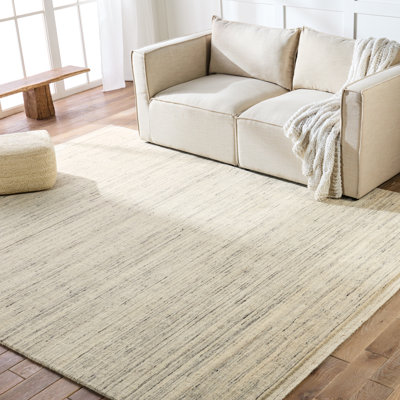 Tapis crème / bleu clair fait à la main Janaiyah (10 pi x 14 pi)
