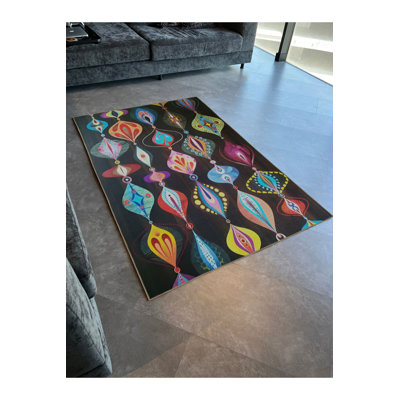 Tapis décoratif moderne et multicolore noir