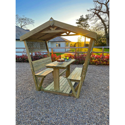 Breslyn 212cm W x 144cm D Solid Wood Arbour with Bench in Brown
