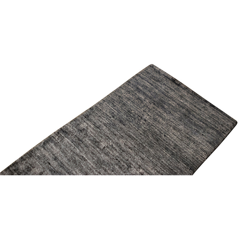 Tapis gris foncé noué à la main
