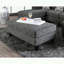 Transitional Style Ottoman with Tapered Legs