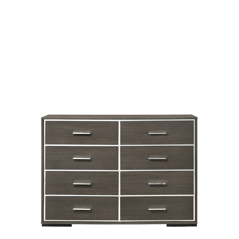 La commode moderne Escher avec des tiroirs spacieux et une conception élégante est parfaite pour organiser et rehausser n'importe quelle chambre à coucher.