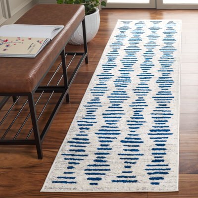 Tapis abstrait en polypropylène tissé à la machine en ivoire / bleu marine Jurrian