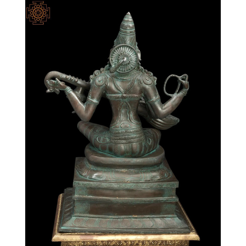 Statue Saraswati assise
