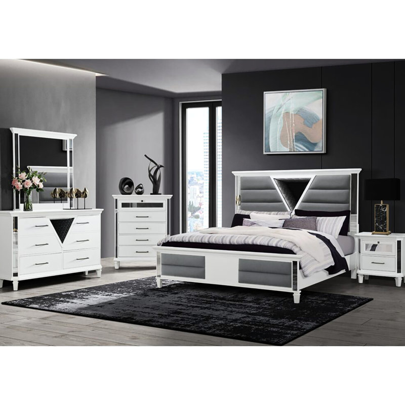Table de chevet contemporaine blanche avec détails en miroir et élégance de chambre à coucher