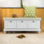 Banc de rangement d'inspiration rétro avec siège rembourré, portes rainurées-470578641