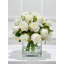 Roses avec fleurs artificielles dans un vase