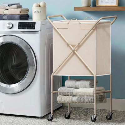 Laundry Basket: 88-liter wheeled laundry cart featuring a collapsible metal frame and a removable, water-resistant liner; 36 inches tall with handles