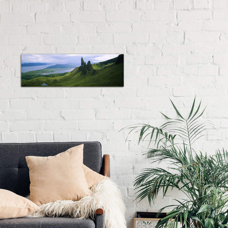 Old Man Of Storr With A High-Angle View Of Loch Leathan, Isle Of Skye, Inner Hebrides, Scotland by Panoramic Images - No Frame Panoramic Print on Canvas