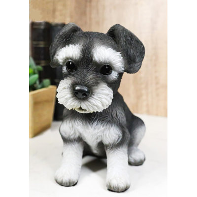 Adorable figurine de chiot miniature Schnauzer