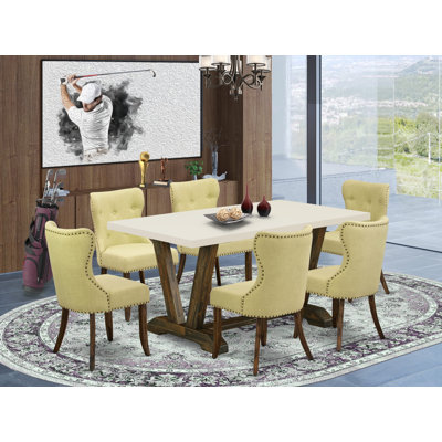 L'ensemble de table 7 pièces contient une table rectangulaire en lin blanc et 6 chaises de cuisine Limelight en tissu lin - finition jacobine patinée