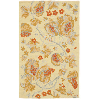 Emrick Hand Hooked Wool/Cotton/Latex Floral Rug in Beige