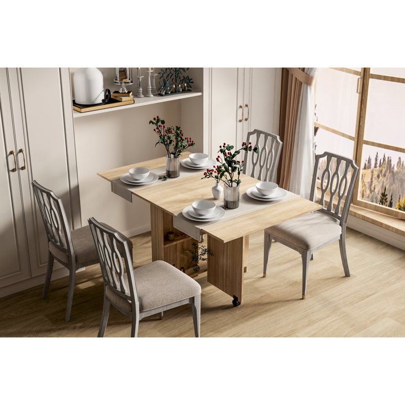 Table de salle à manger pliante avec 2 rangements, forme rectangulaire, 6 places, style moderne, bois de peuplier, facile à monter et à ranger, rangements inclus, design moderne et épuré.