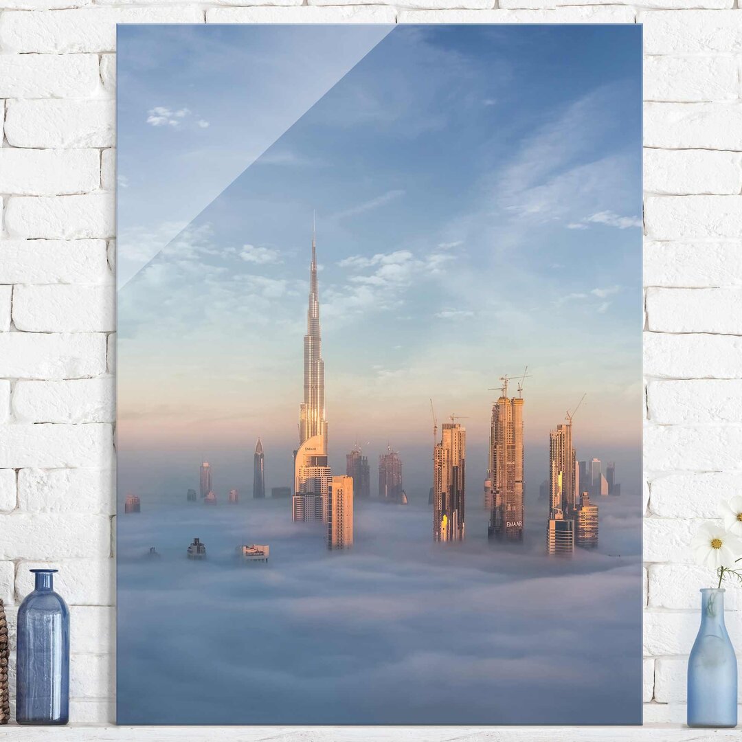 Glasbild Dubai über den Wolken