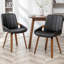 Chaise rembourrée en similicuir Kelham -525314974