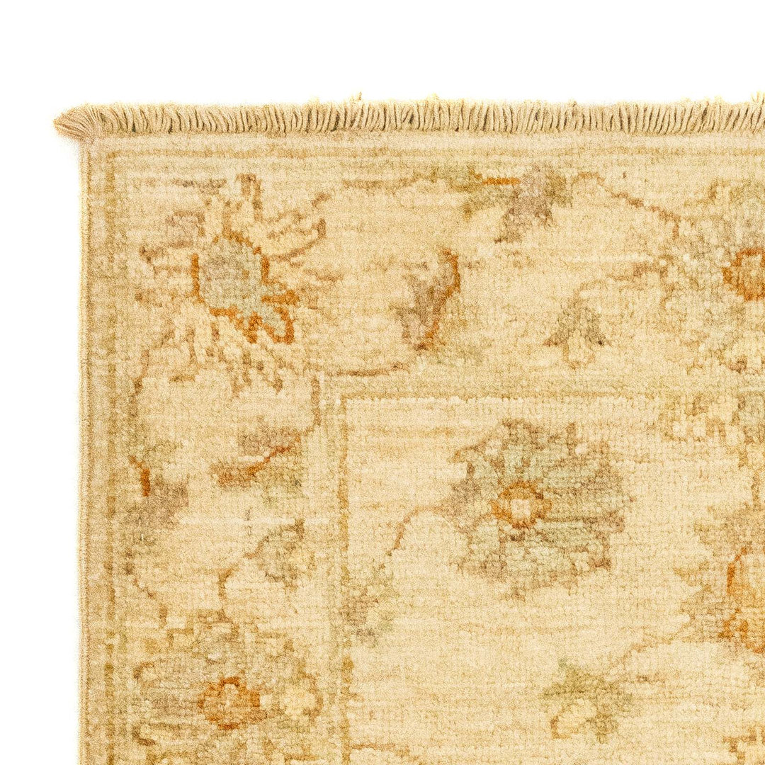 Handgefertigter Teppich Alysabeth aus Wolle in Beige