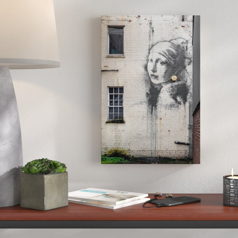 The Girl With The Pierced Eardrum by Banksy - Wrapped Canvas Print, 46 cm H x 30 cm W x 3 cm D