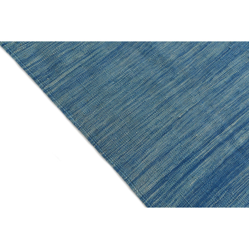 Tapis bleu Paquette