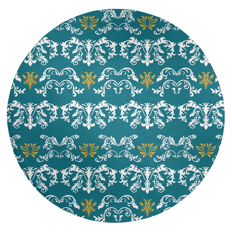 Tapis rond bleu damassé à motif baroque
