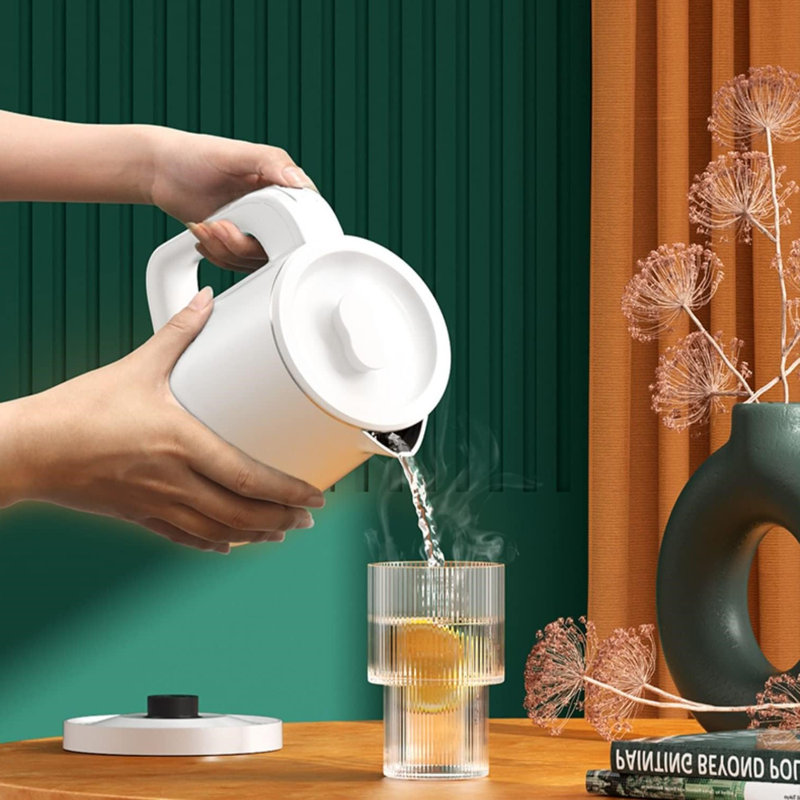 Compact White Stainless Steel Electric Travel Kettle with Auto Shut-Off