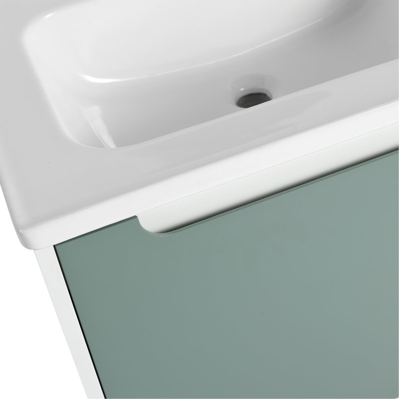 Élégant meuble-lavabo mural avec lavabo en céramique et porte à fermeture en douceur, offrant un début paisible et tranquille à chaque journée.