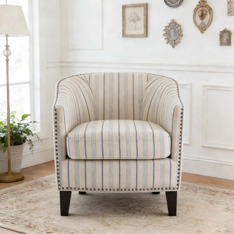 Fauteuil demi-tonneau rembourré à rayures