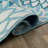 Ramveer Floral Blue/Ivory Reversible Indoor/Outdoor Plastic Straw Area Rug-159560923