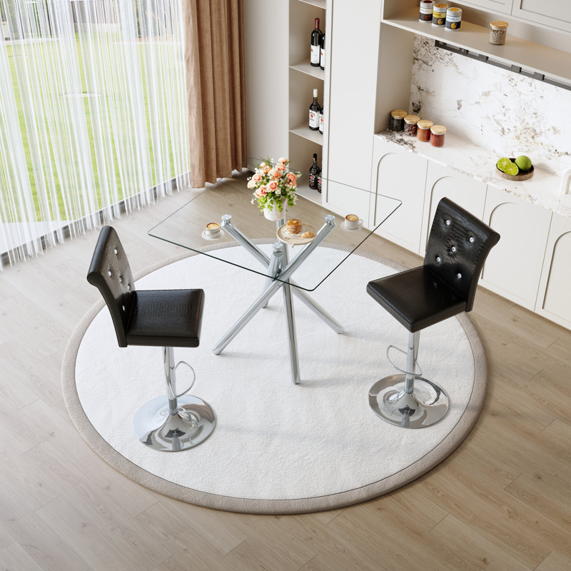 Ensemble de bar moderne avec tabourets réglables en chrome et table en verre pour petites cuisines
