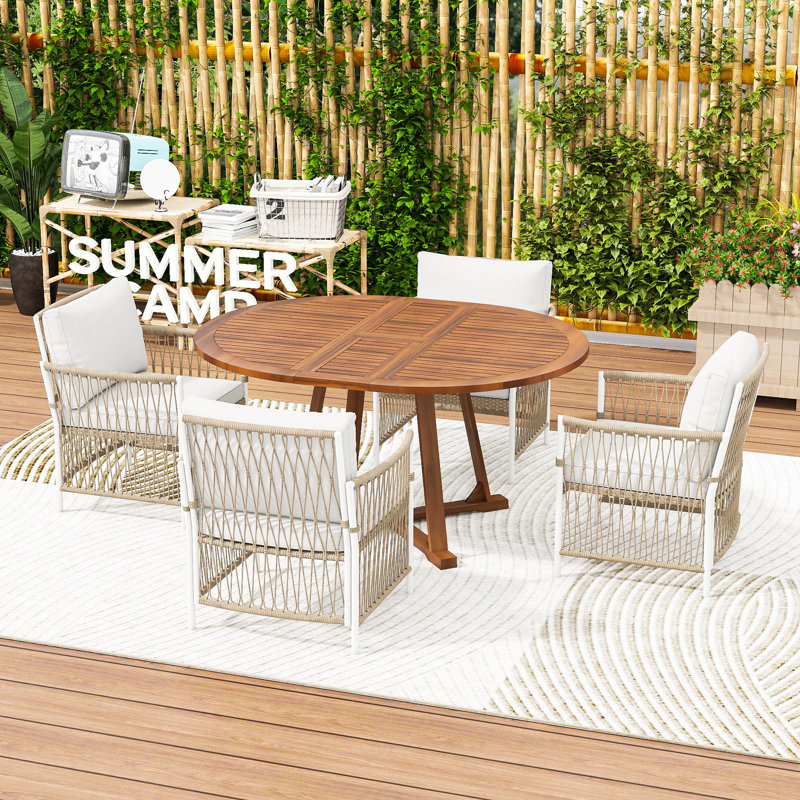 5-Piece Extendable Patio Dining Set with a Butterfly Leaf Round Table and 4 Rattan Cushioned Armchairs