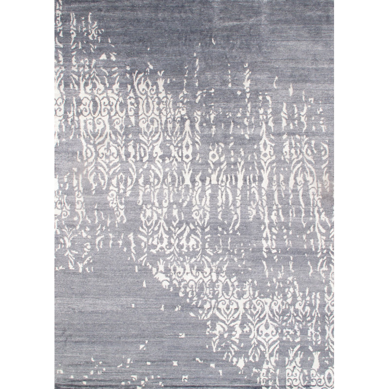 Tapis gris / blanc en laine noué à la main