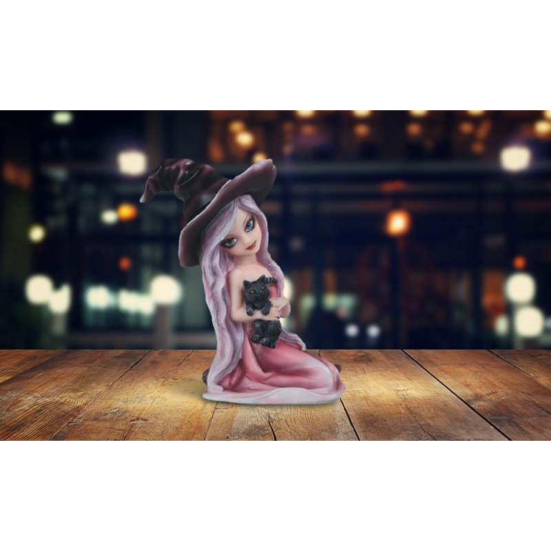 Figurine de fille sorcière rose avec chat noir