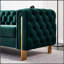 Canapé moderne en velours avec dossier capitonné et structure durable, parfait pour le confort et le style de tout espace de vie.