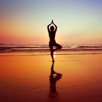 Yoga On Beach by NicoElNino - Wrapped Canvas Print