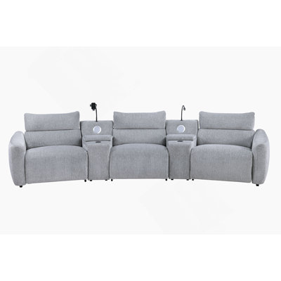 Canapé modulaire modulaire à mouvement électrique avec console, offrant des chargeurs sans fil, des porte-gobelets, des haut-parleurs, un support pour téléphone et une lampe de lecture pour un confort accru
