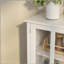 Buffet storage cabinet with double glass doors and unique bell handle