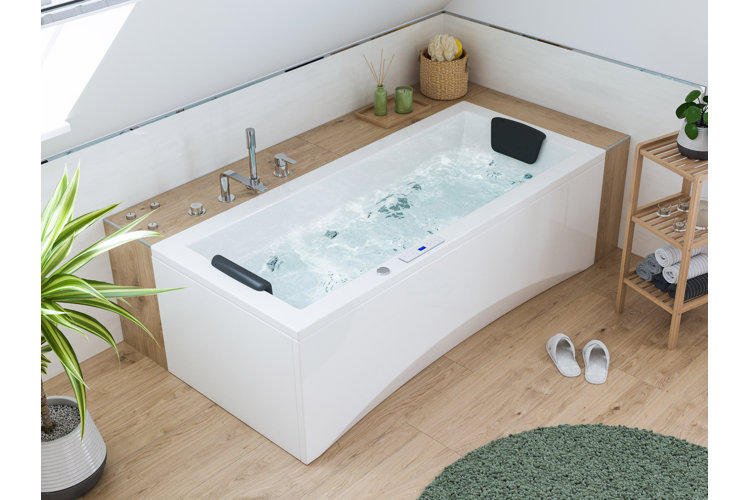 white whirlpool bathtub in a modern bathroom